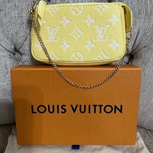 Louis Vuitton Mini Pochette in Empreinte Leather, NWT